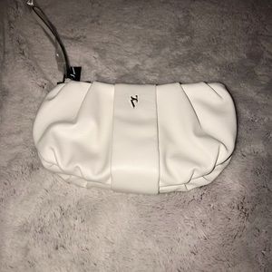 NWT.  Simply Vera wang wristlet.